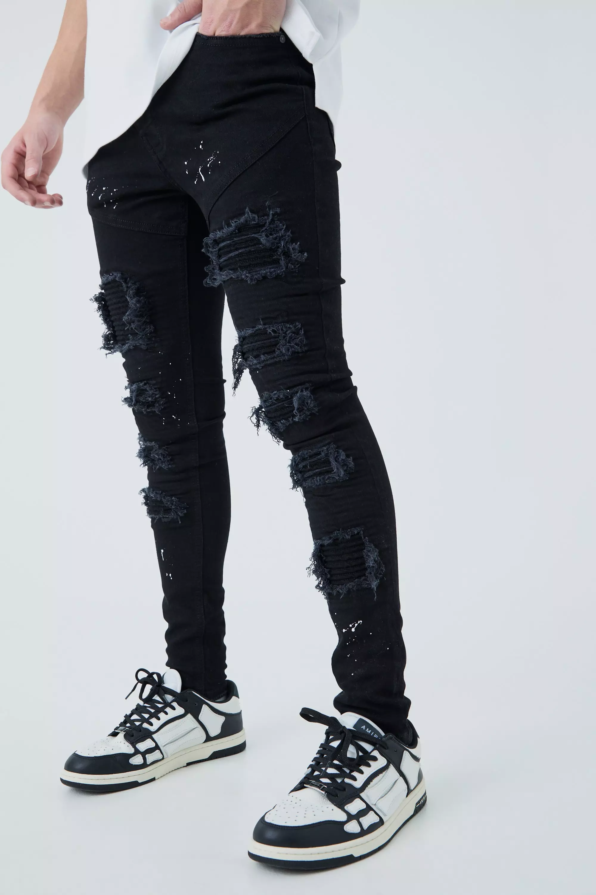 Black ripped store jeans for men